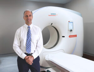 Edward Danehy with CT Machine